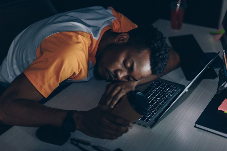 A man at work with his head on the table